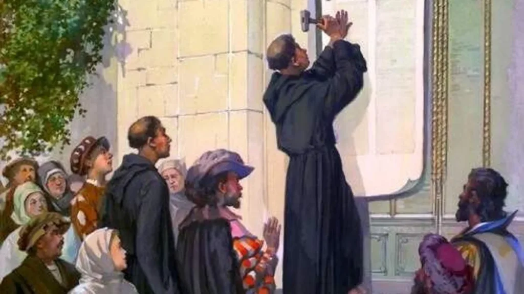 Imagem martinho lutero afixa suas teses 001 do artigo Igreja na Idade Moderna: Fatores que impulsionaram a Reforma Protestante