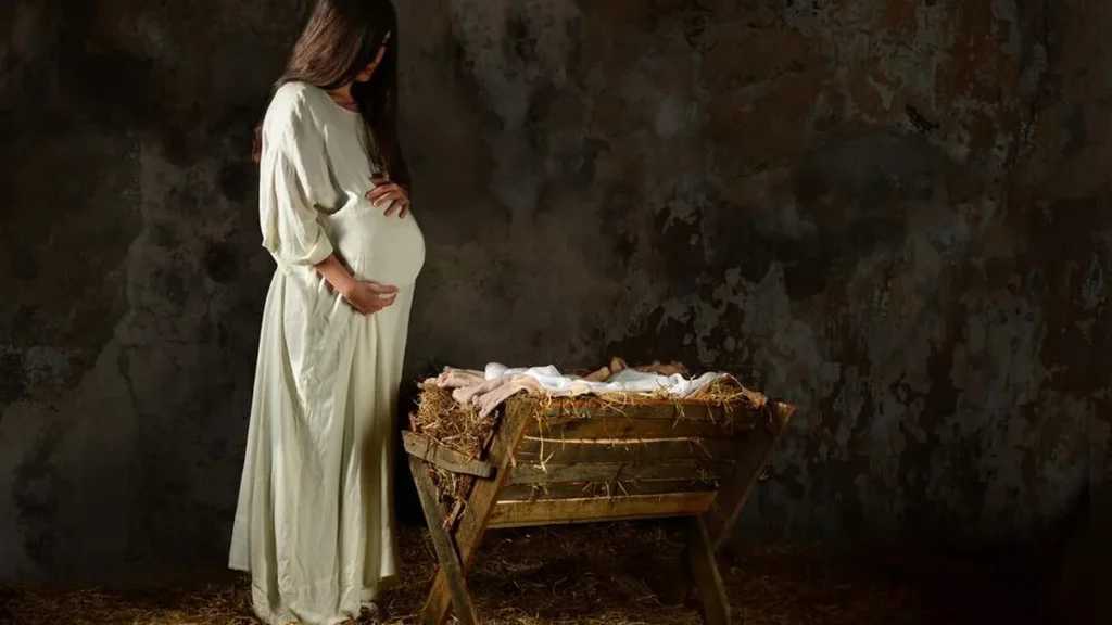 Imagem mulher gravida em frente a uma manjedoura do artigo Por que Maria não teve mais filhos?