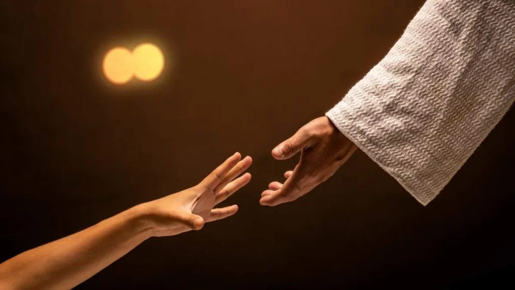 Imagem mao estendida de Jesus encontrando a mao de uma pessoa do artigo 4 dicas para você se aproximar de Jesus neste Advento