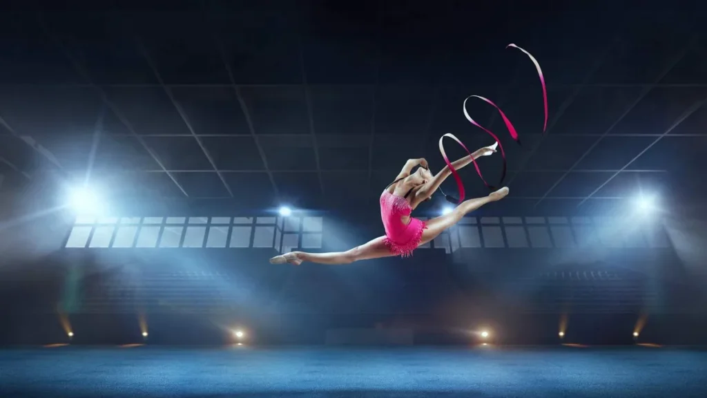 Imagem Ginasta dancando com fitas do artigo Aparecida recebe o Torneio Nacional de Ginástica Rítmica