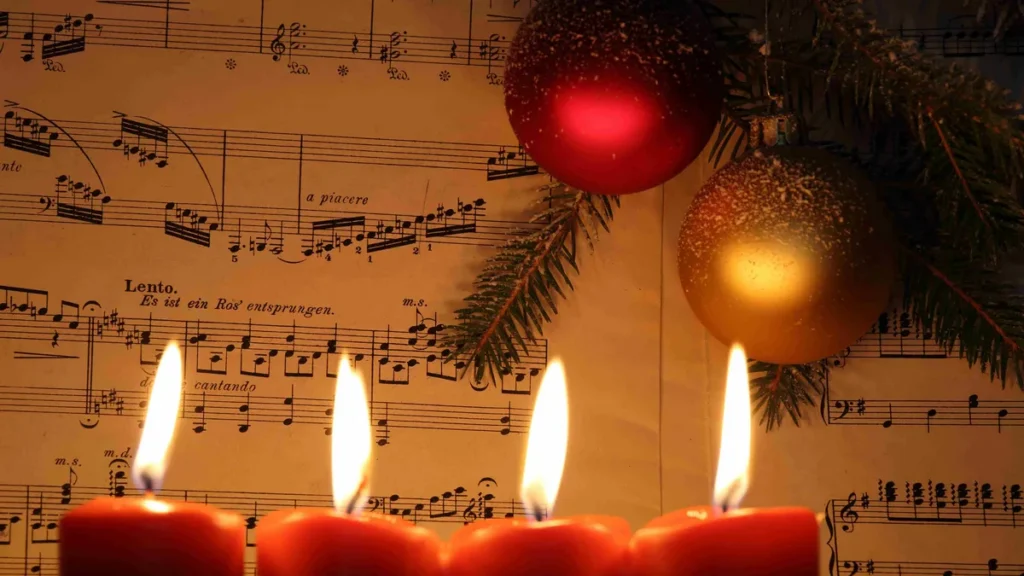 Imagem Velas do Advento com partitura de musica do artigo Músicas do Advento que inspiram a oração em família